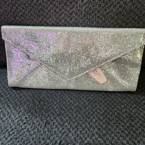 Womens silver Clutch with tags